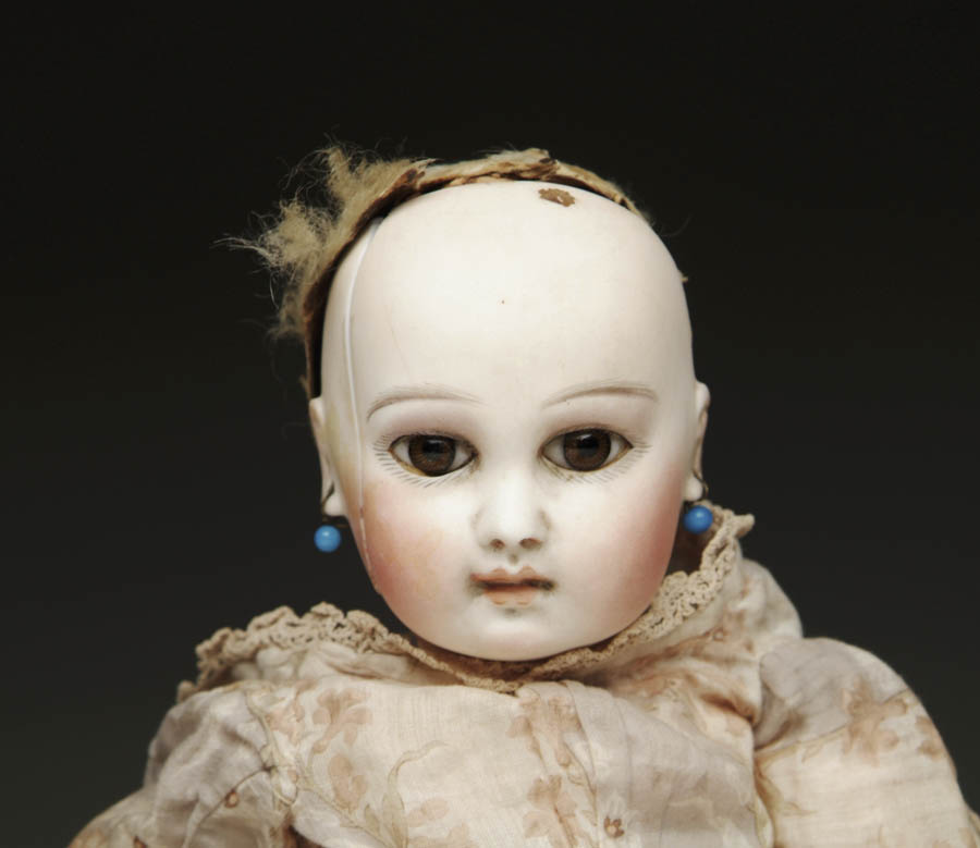 Appraisal: EARLY PORTRAIT JUMEAU BEBE - cm Early doll with brown