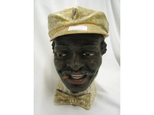 Appraisal: Black Americana Figural Tobacco Jar 's chalkware man with cigar