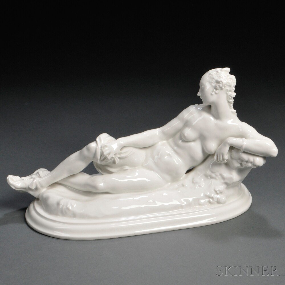 Appraisal: Berlin Porcelain White Glazed Reclining Nude Germany early th century