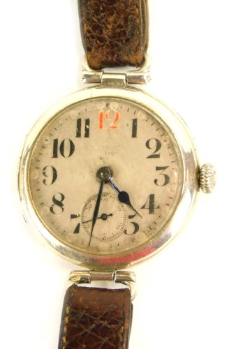 Appraisal: A 's silver cased wristwatch with a silvered coloured dial