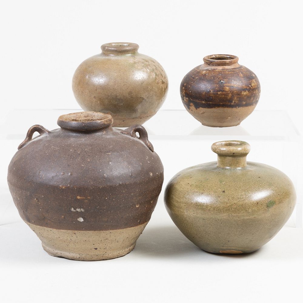 Appraisal: Group of Four Chinese Glazed Pottery Jarlets The largest in