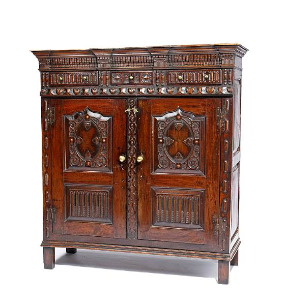 Appraisal: An English Baroque oak cupboard late th century The outset