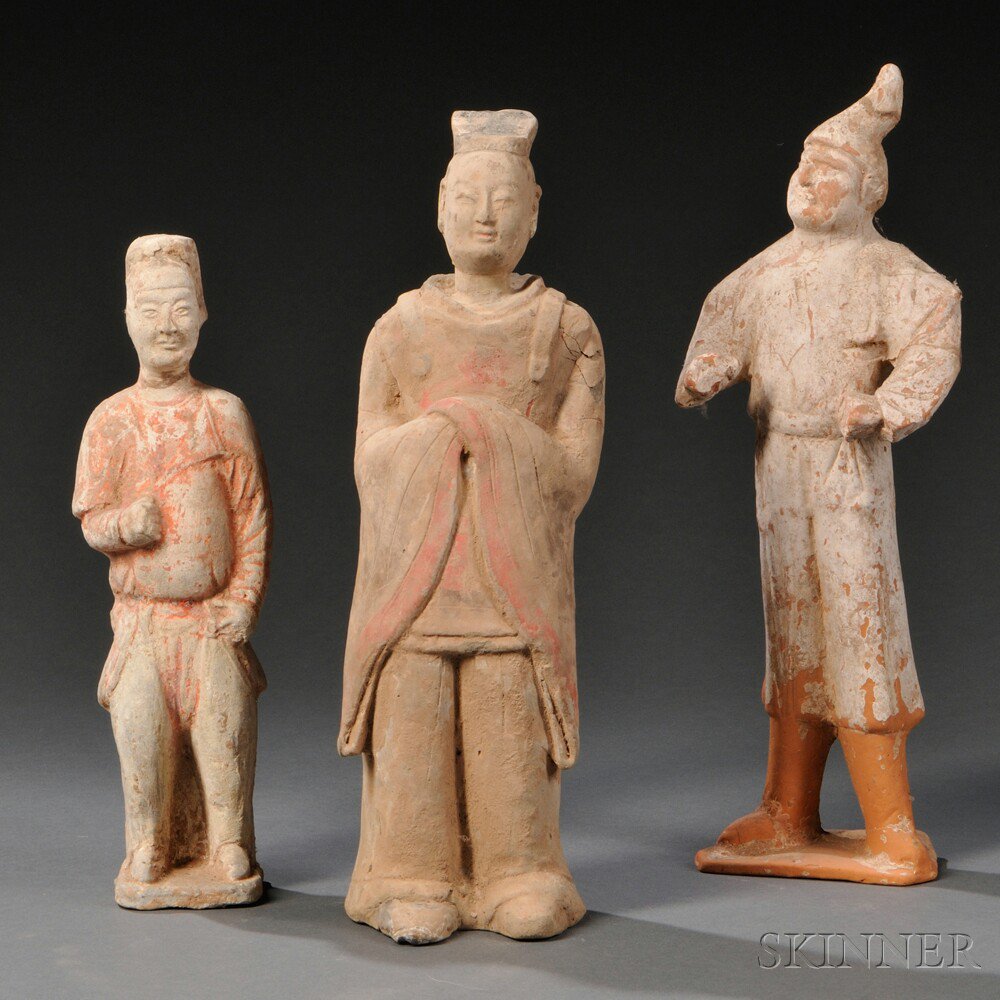 Appraisal: Three Pottery Tomb Figures China Han Dynasty style standing figures