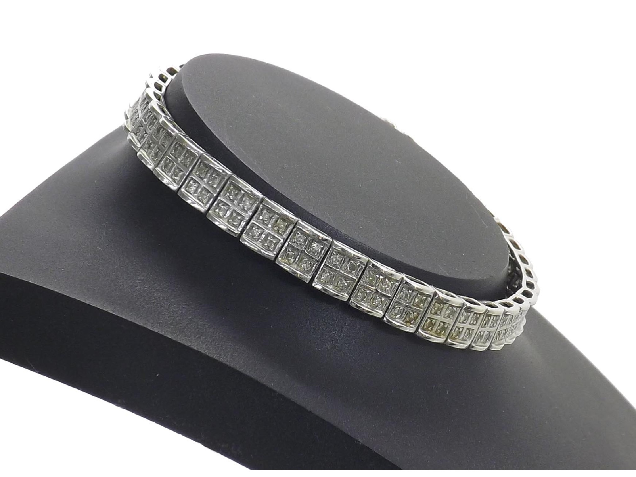 Appraisal: White gold diamond line bracelet with eight-cut diamonds in a