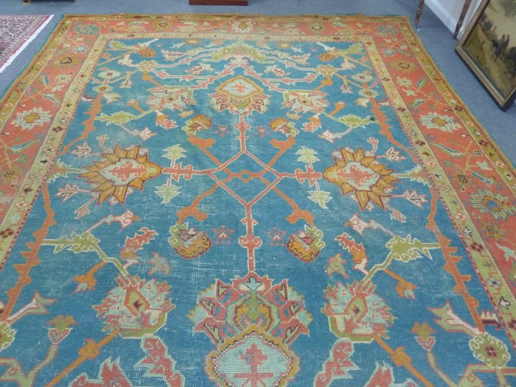 Appraisal: A large Oushak West Anatolia carpet circa with pole medallions