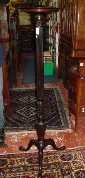 Appraisal: A mahogany torchere