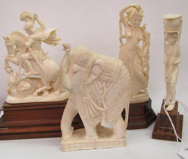 Appraisal: Four carved ivory figures one elephant and three Oriental figures