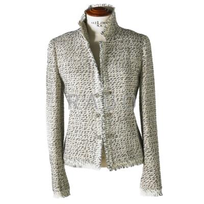 Appraisal: CHANEL TWEED CREAM AND BLACK JACKET Three pairs of double-link