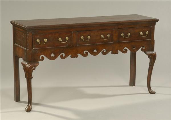 Appraisal: An oak open low dresser in George II style mid-late