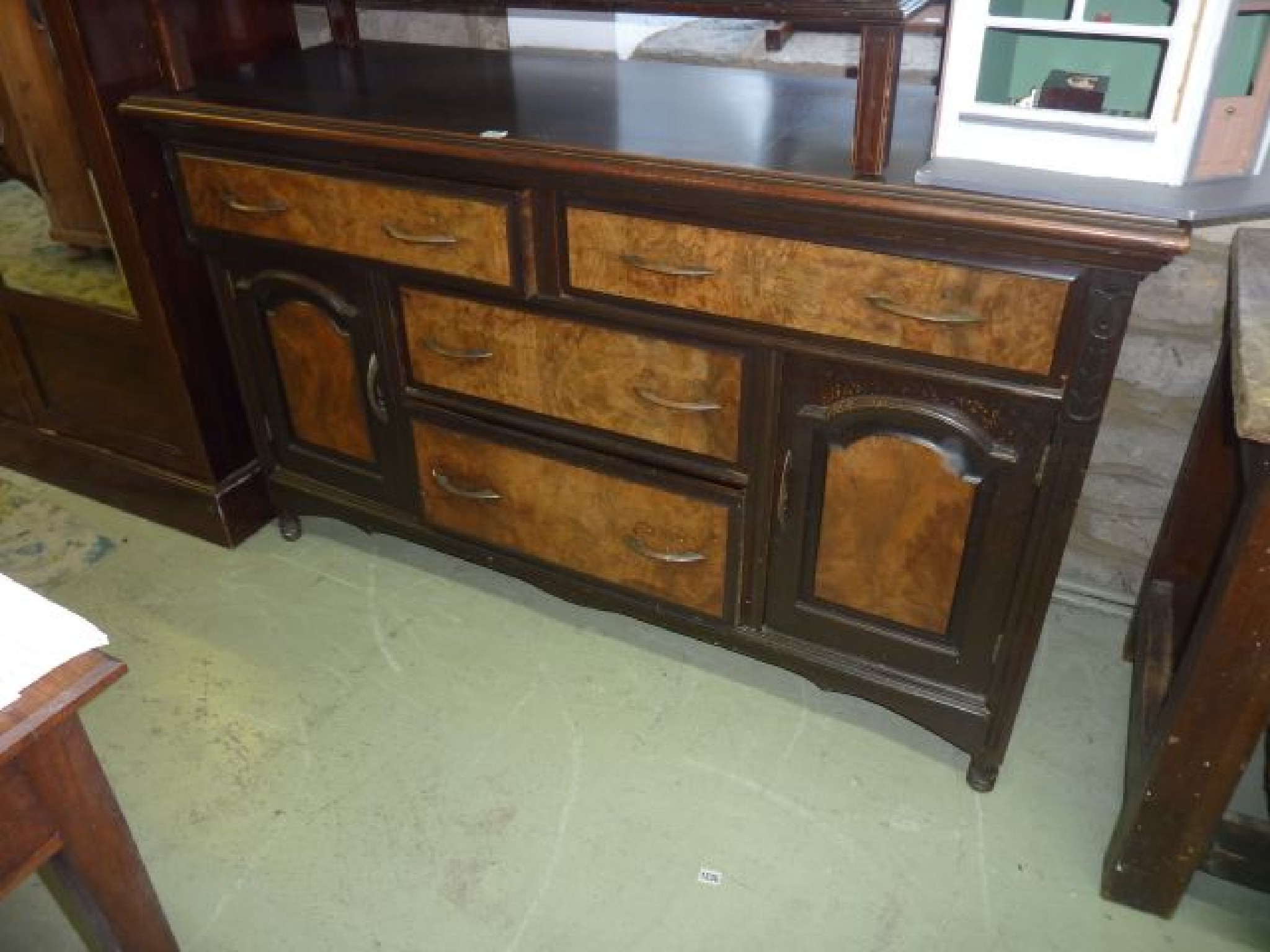 Appraisal: A late th century walnut and figured sideboard fitted with