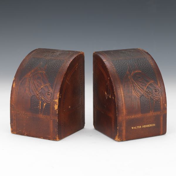 Appraisal: LEATHER CLAD HORSE BOOKENDS H x x Wood bookends with