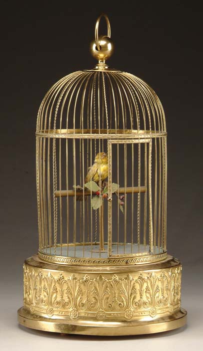 Appraisal: BRASS MUSIC BOX BIRDCAGE The brass birdcage has a brass