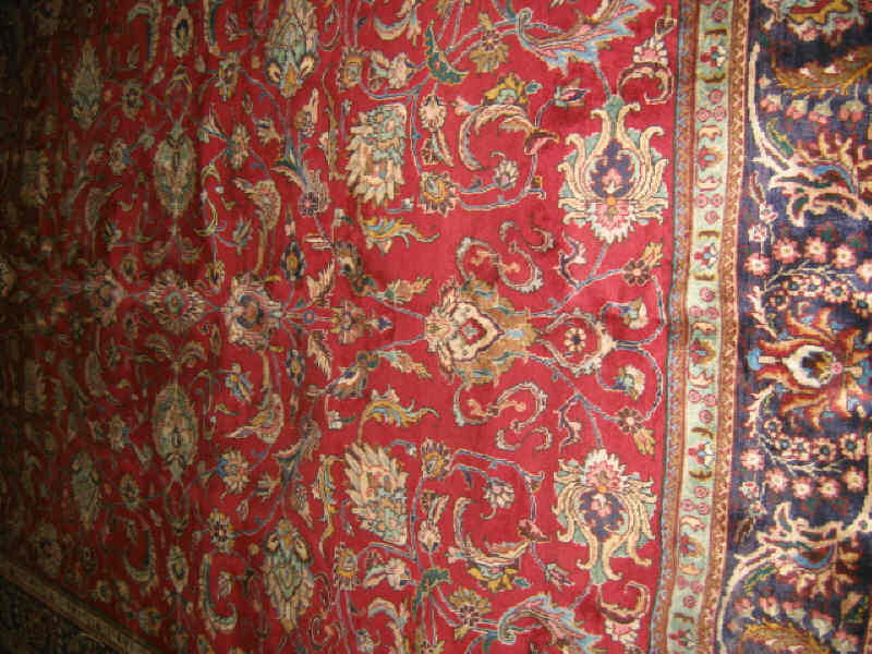 Appraisal: TABRIZ ROOM RUG The burgundy field with all over curvilinear