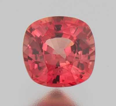 Appraisal: An Unmounted Orange Sapphire Cushion cut weighting ct Origin Sri