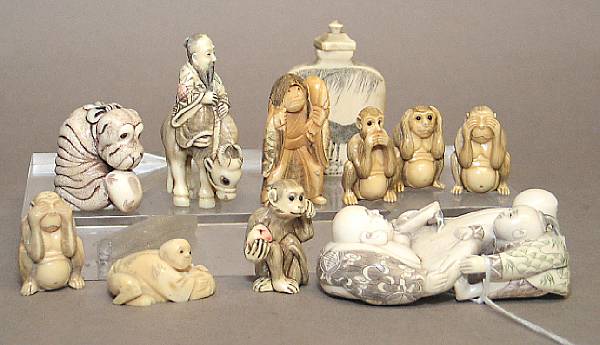 Appraisal: A group of small Chinese and Japanese carvings Including twelve