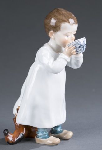 Appraisal: Child sipping blue onion cup Crossed swords in underglaze blue