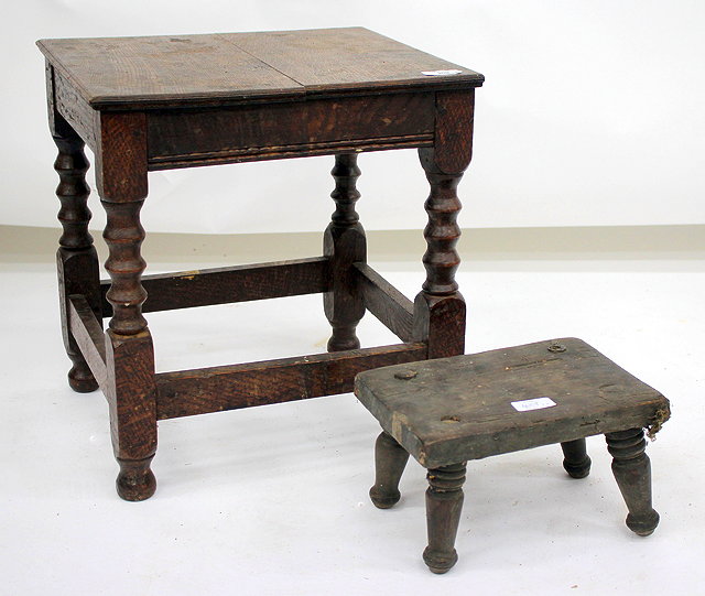 Appraisal: AN ANTIQUE ELM FRAMED JOINT STOOL with bobbin turned supports