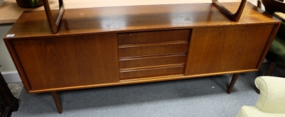 Appraisal: Teak sideboard with drawers and sliding doors by Steens Denmark