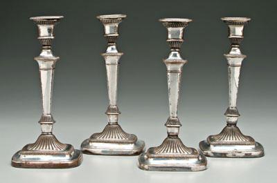 Appraisal: Set four silver plated candlesticks rounded square tapering columns gadroon