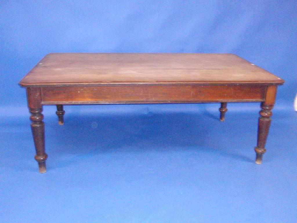 Appraisal: A Victorian mahogany office or library table with moulded top