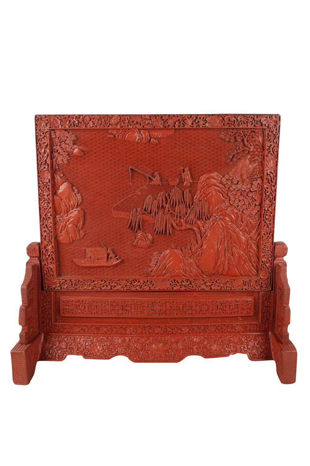 Appraisal: CHINESE CINNABAR TABLE SCREEN ON STANDdepicting figures in a coastal