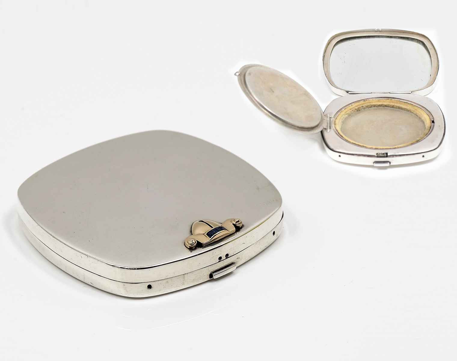 Appraisal: VINTAGE STERLING COMPACT WITH K CLASP SAPPHIRES Vintage sterling compact