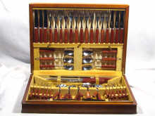 Appraisal: A boxed set of cutlery comprising twelve place settings in