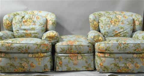 Appraisal: PAIR OF JESSICA CHARLES UPHOLSTERED SWIVEL ROCKERS The oversized armchairs