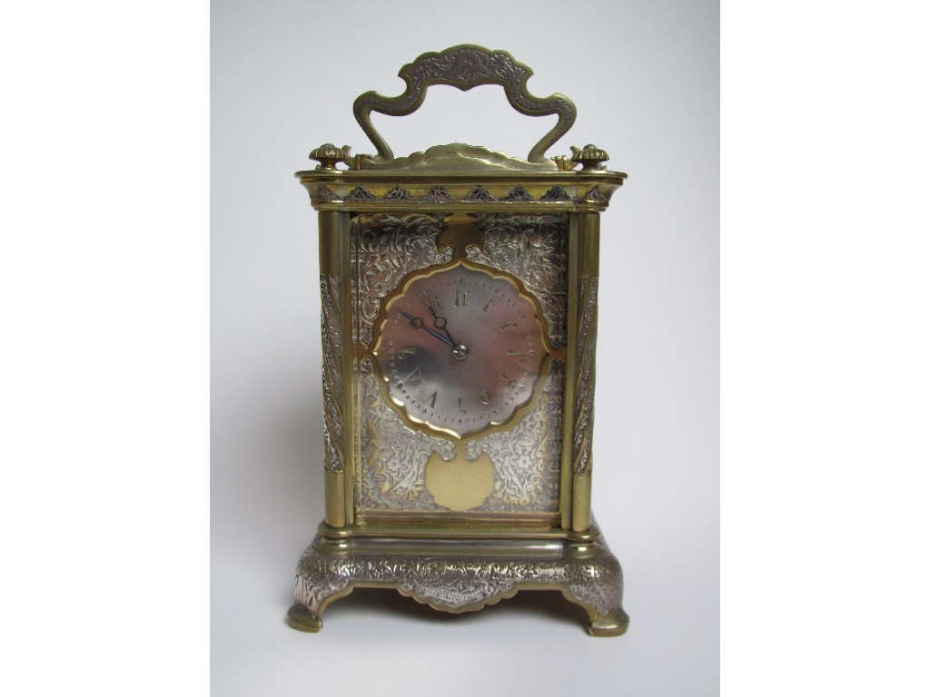 Appraisal: An Anglo Indian brass repeating carriage clock the ornate case