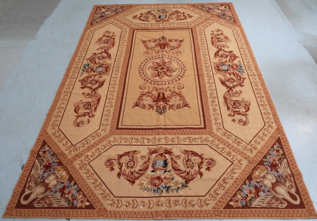 Appraisal: SEMI ANTIQUE NEEDLEPOINT RUG Europe th CenturyRose purple umber pink