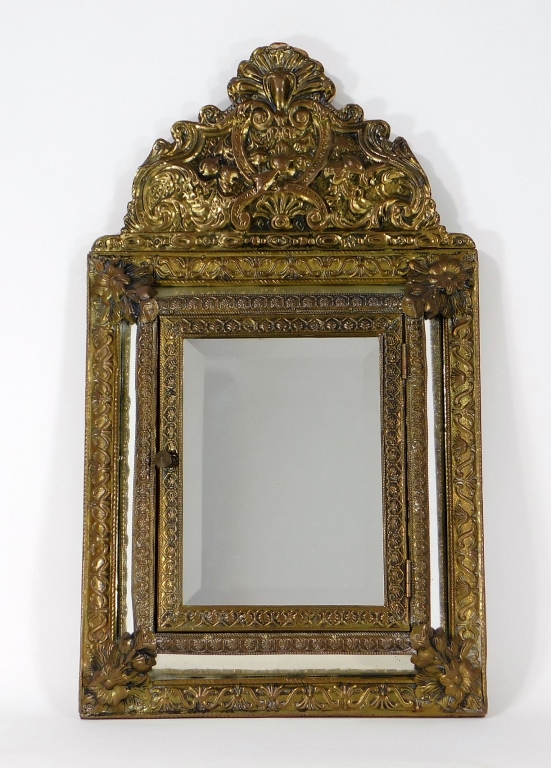 Appraisal: C FRENCH NAPOLEON LLL REPOUSSE BRASS MIRROR France th CenturyProfusely