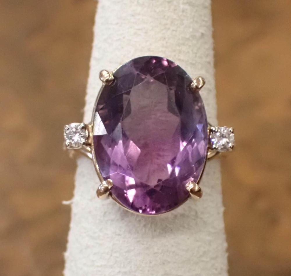 Appraisal: AMETHYST DIAMOND AND FOURTEEN KARAT GOLD RING The yellow gold