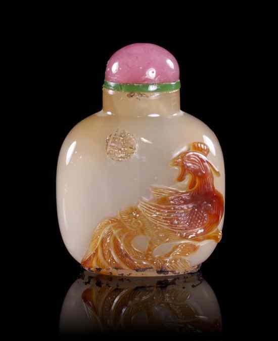 Appraisal: An Agate Cameo Carved Snuff Bottle of tan colored stone