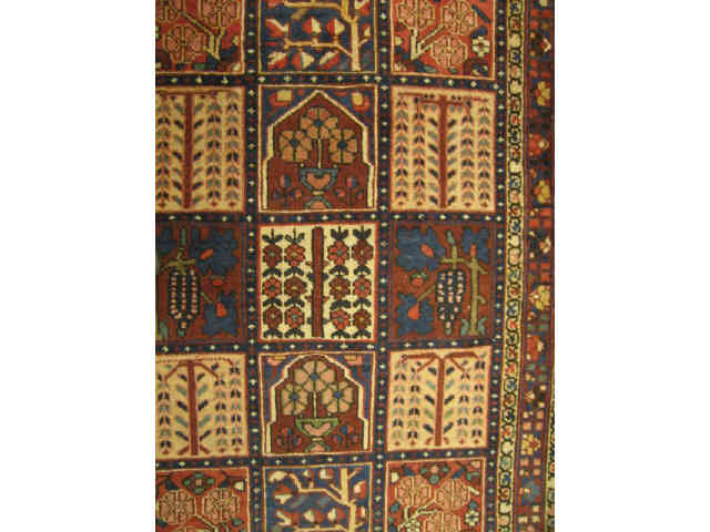 Appraisal: Bakhteiari Persian Handmade Rug panels of stylized flowers flowering vine