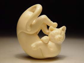 Appraisal: CONTEMPORARY IVORY NETSUKE Very finely carved and polished contemporary ivory