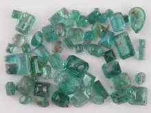 Appraisal: A quantity of loose polished emeralds approx carats