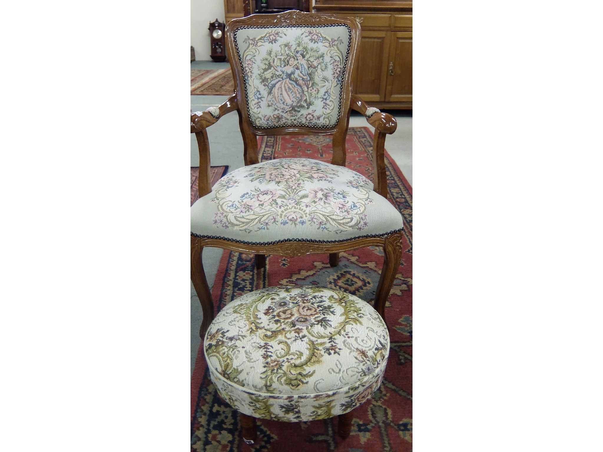 Appraisal: French style open armchair with similar embroidered stool