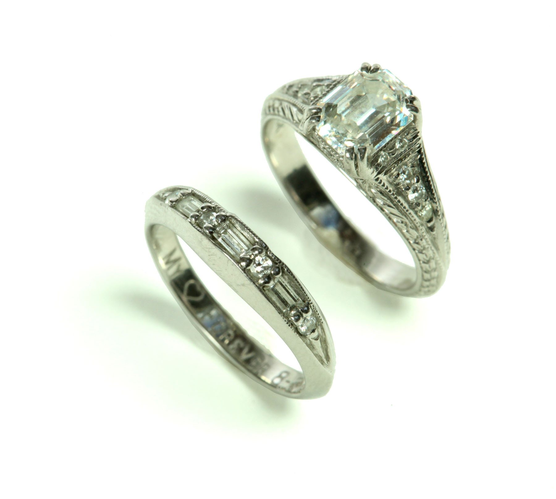 Appraisal: WEDDING RING SET Twentieth century Platinum and diamond set featuring