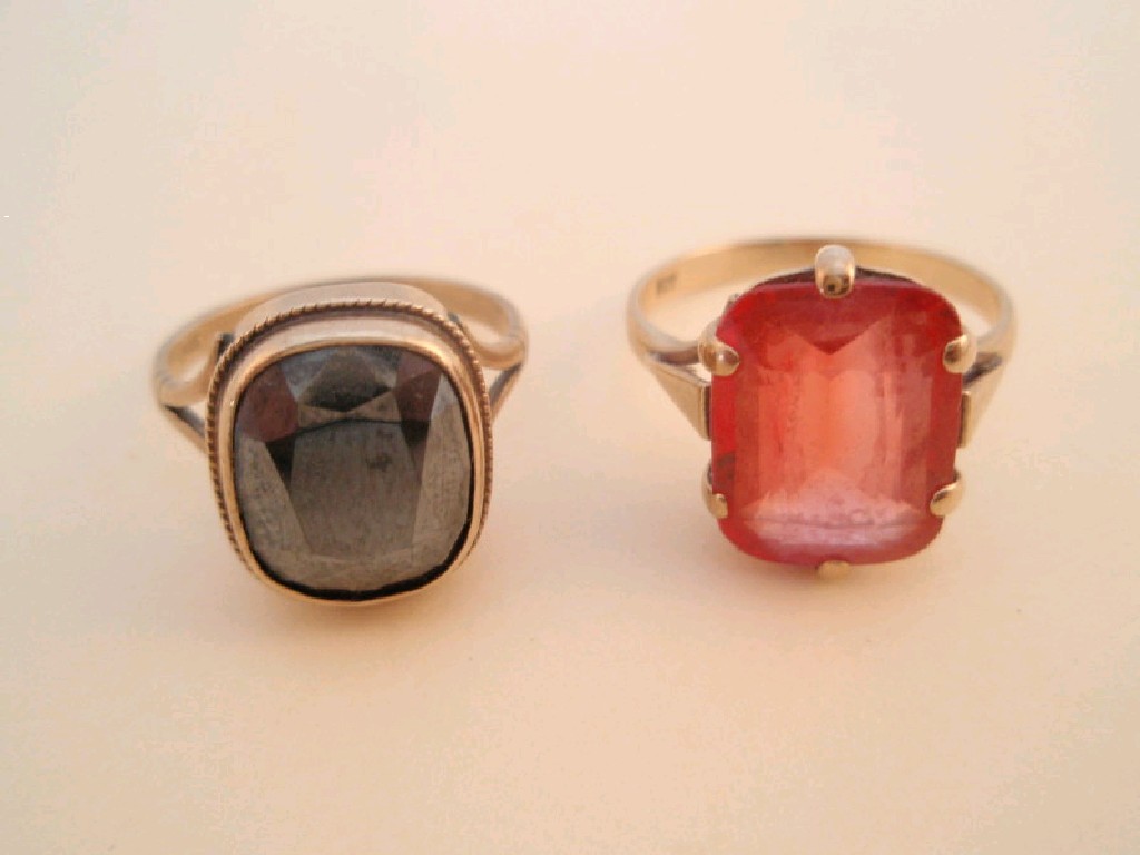 Appraisal: A ct gold red stone set dress ring and another