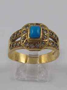 Appraisal: A diamond and turquoise ring set in yellow metal tests