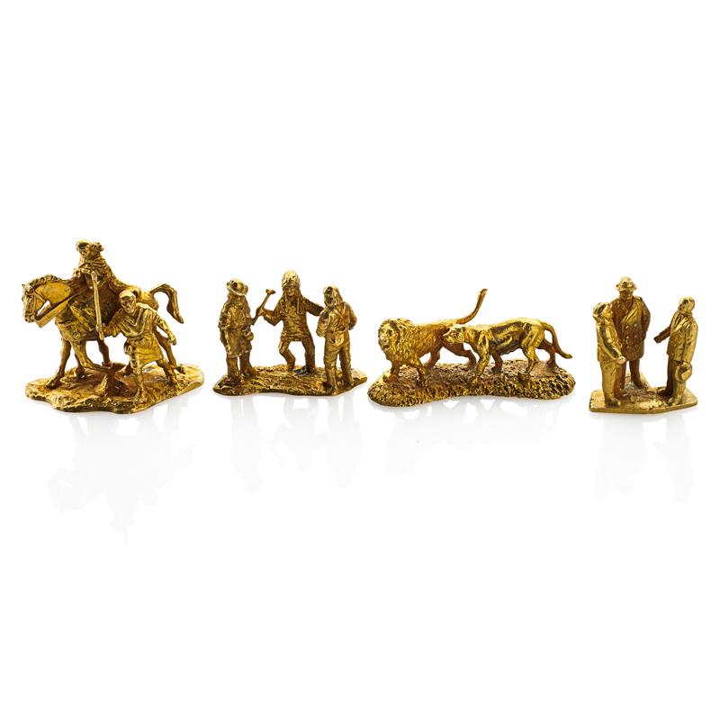 Appraisal: COLLECTION OF YELLOW GOLD FIGURAL GROUPS Four pieces Cast forms