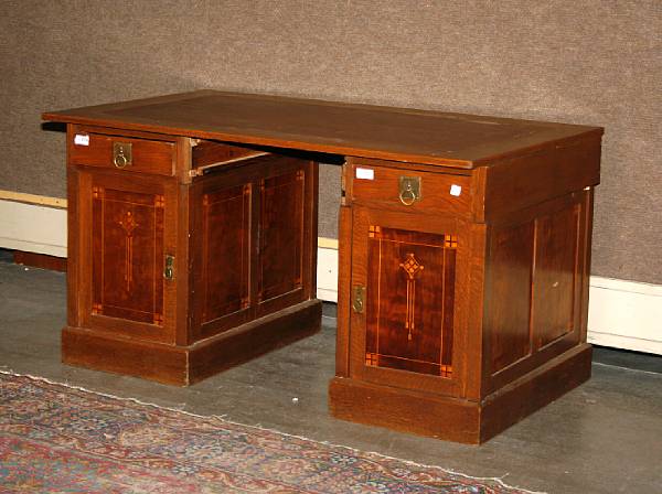 Appraisal: An English Arts amp Crafts inlaid oak armoire desk and