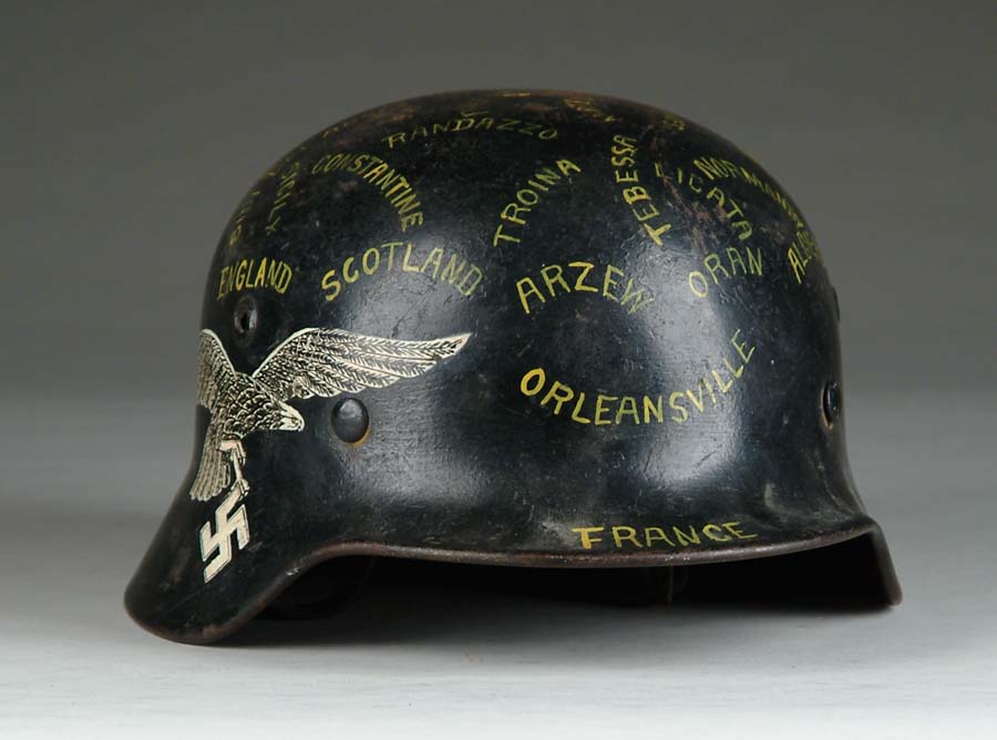 Appraisal: CAPTURED NAZI HELMET Large Luftwaffe eagle painted on the right