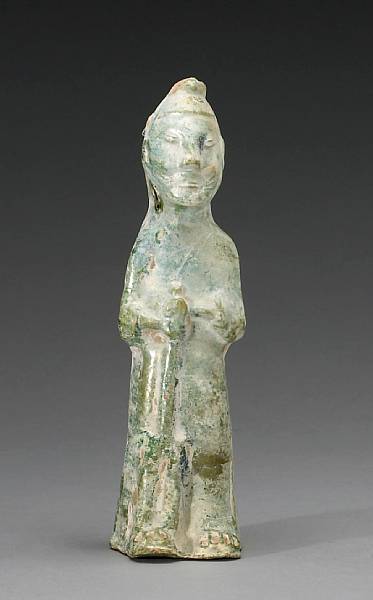 Appraisal: A green glazed pottery tomb guardian Han Dynasty Molded standing