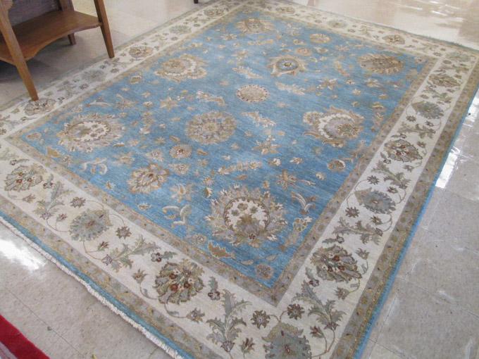 Appraisal: HAND KNOTTED ORIENTAL CARPET Pakistani Persian overall floral design on