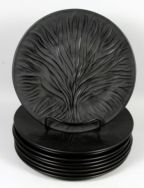 Appraisal: Nine black Lalique dinner plates with tree design diam Property