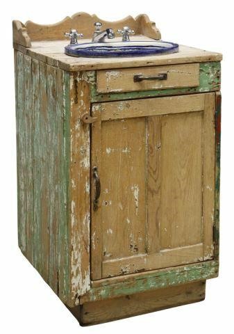 Appraisal: Rustic distressed painted pine freestanding sink cabinet th c overmount