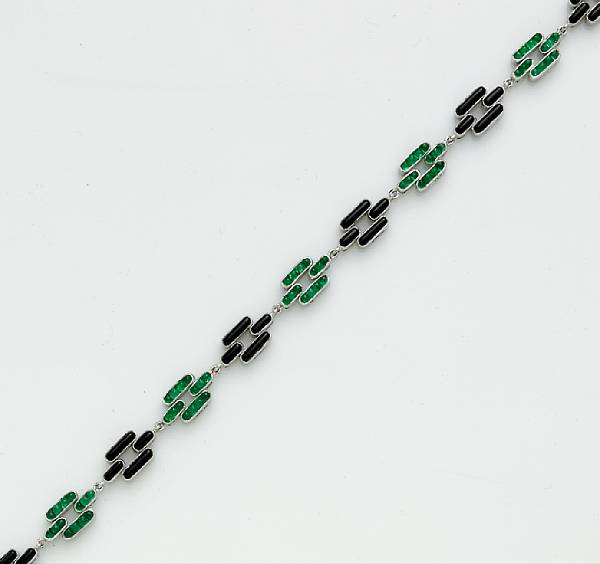 Appraisal: An emerald black onyx and diamond bracelet mounted in eighteen