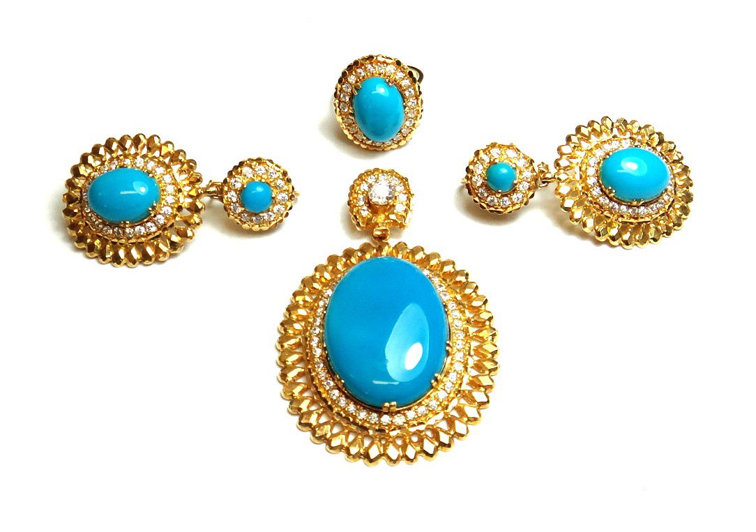 Appraisal: An Eastern gold turquoise and colourless gem set oval pendant