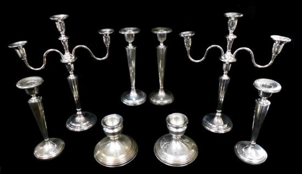 Appraisal: SILVER Four pairs of candlesticks weighted including Pair of International